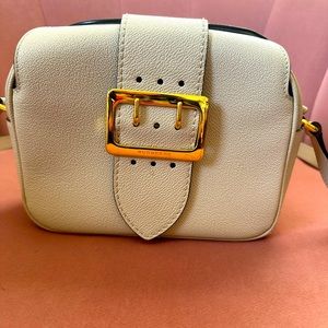 Gently worn Burberry crossbody buckle bag.